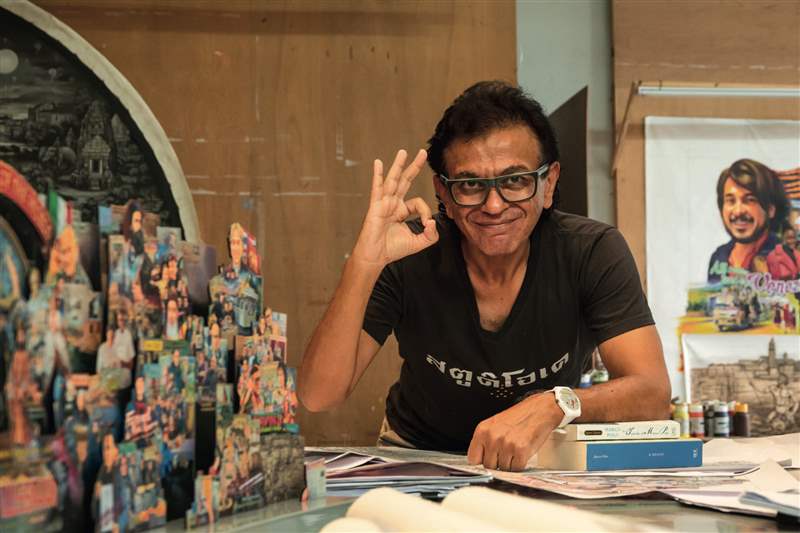 泰国艺术家Navin Rawanchaikul 及其作品《THE DESCRIPTION OF THE WORLD》。